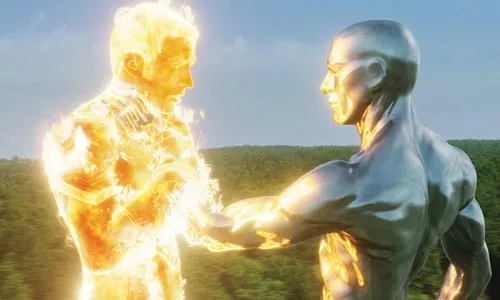 Dude, you're on fire: The Silver Surfer (right) confronts the Human Torch.
