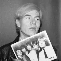 England's newest hitmakers: Andy Warhol with a 1964 Rolling Stones publicity photo. - PHOTO COURTESY OF THE ANDY WARHOL MUSEUM.