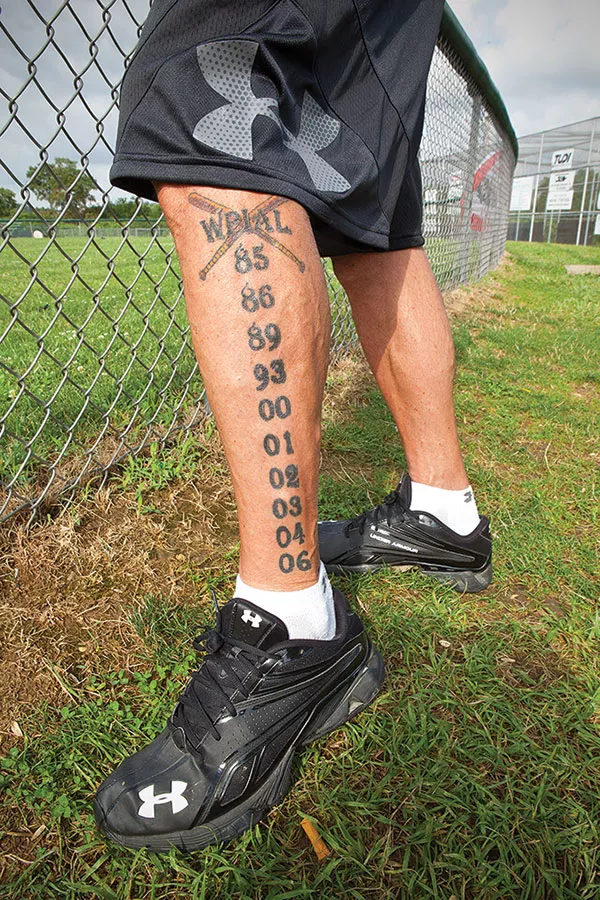 Former Coach Bill Palermo had the years of the team's 10 WPIAL championship titles tattooed on his leg.