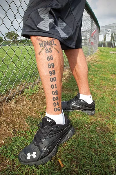 Former Coach Bill Palermo had the years of the team's 10 WPIAL championship titles tattooed on his leg.