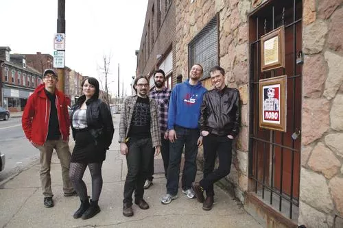Here be Robots: Mike Q Roth, Holly Smith, Christopher Schwarzott, Bret Strawn, Brian Gruetze and Michael Baltzer at the site of the new Mr. Roboto Project - HEATHER MULL