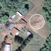 In this aerial shot of Tiger Ranch, taken from Google Earth, the circled area shows where cats are buried on the property, according to Deb Urmann.