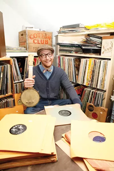 Is that a banjolele? Elliott Sussman shows off his stash. - PHOTO BY HEATHER MULL