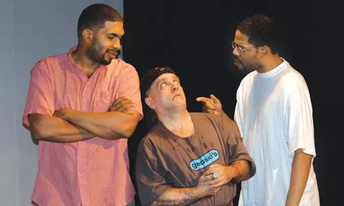 It's a lock: (left to right) David Conly, Jeff David Miller and Ezra Leslie Smith star in Wali Jamal's "Holding Cell," at the Theatre Festival in Black and White.