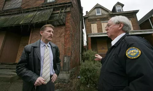 Jim Richter (left) with building code inspector Rich Weaver - HEATHER MULL