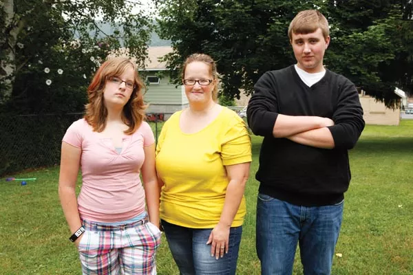 Josh Miller's ex-wife, Brandi Mangus (center), with their two children, Caitlyn and Josh, Jr. Miller - PHOTO BY HEATHER MULL