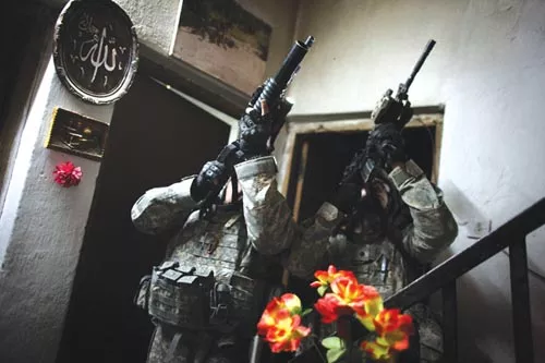 Michael Kamber's "Soldiers on patrol in Iraq" (2008), a still image from the video Military Censorship (2010) - COURTESY OF THE ARTIST AND WITH PERMISSION FROM MICHAEL SHAW, BAGNEWSNOTES