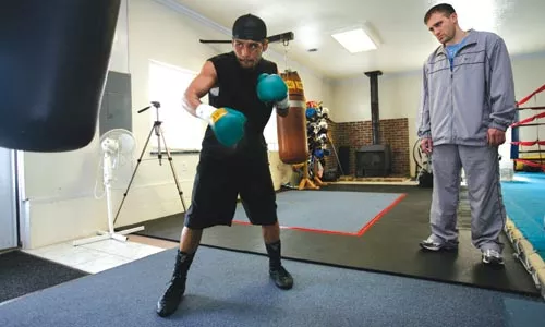 Monty Meza-Clay, with trainer Tommy Yankello, is hoping to fight this spring after a controversial TKO Jan. 29.