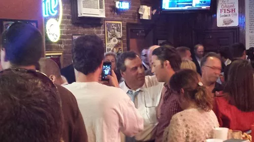 NJ Gov. Chris Christie meets with the crowd at Primanti Brothers