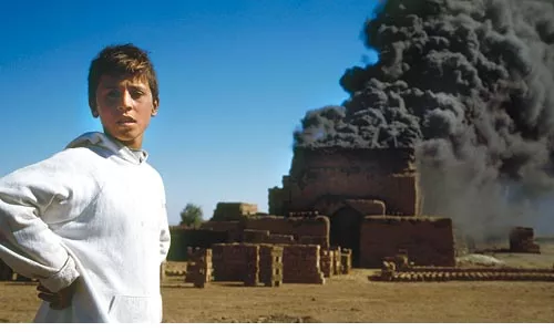Not a bomb: A young Kurd and smoke from the local brick oven.
