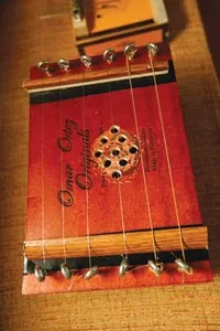 "Original" indeed: A cigar-box zither Tamburo crafted for his annual "Build Your Own Instrument" show - HEATHER MULL