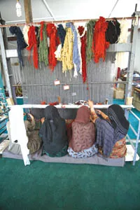 Over the objections of conservative religious officials, Emergency's Anabah hospital shelters a carpet factory run by war widows, who otherwise would have to beg for a living.