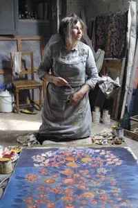 Pigments of her imagination: Yolande Moreau as the painter Sraphine Louis.