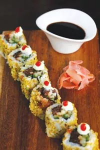 Pineapple-soy ahi tuna and jicama maki rolls with pistachio dust - HEATHER MULL