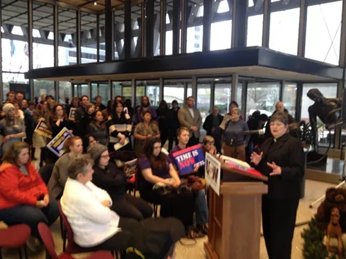 Rev. Linda Theophilus addresses a crowd at United Steelworkers headquarters this morning