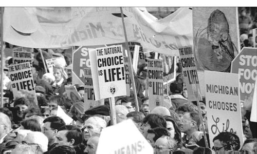 Signs of the times: an anti-abortion rally depicted in Lake of Fire
