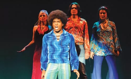 Teddey Brown (foreground), with (left to right) Tess Soltau, Bradley Beahen and Tess Primack, in Pittsburgh CLO's production of 8-TRACK: The Sounds of the 70's. - PHOTO COURTESY OF MATT POLK.