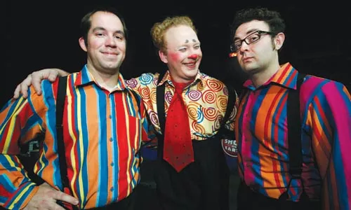 The boys in the band: Bassist Steve Palko (left) and drummer Jeremy Papay (right) with their coworker Vas - HEATHER MULL