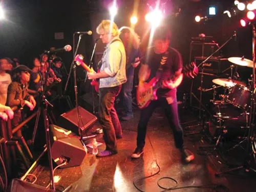 "The Pittsburgh M.O.T.O.": Caporino with Sam Matthews and Dan McNellie in Japan. - COURTESY OF ALICIA LADDEN
