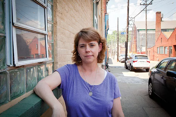 Tina Gaser, who lives near the foundry, says she doesn't want the facility to close but expects that the Allegheny County Health Department will ensure residents healthy air to breathe. - PHOTO BY HEATHER MULL