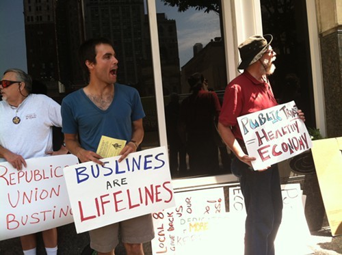 Transportation advocates demonstrate in front of Gov. Tom Corbetts office for dedicated funding for mass transit