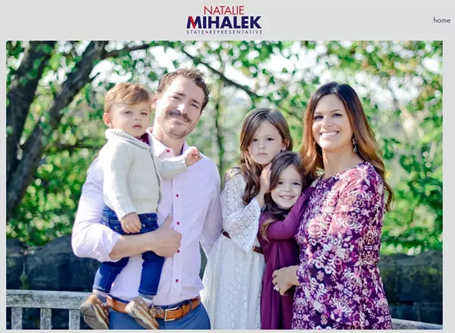 Natalie Mihalek (right) with her family, as seen on her campaign website. Same photo appears in Florida congressional ad. - SCREENSHOT FROM CAMPAIGN WEBSITE