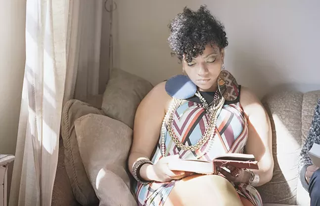 “Abigail reading Angela Davis” - IMAGE COURTESY OF THE ARTIST AND MONIQUE MELOCHE GALLERY, CHICAGO