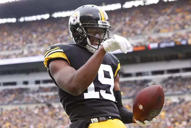JuJu Smith-Schuster does his impression of the salt bae following a catch. - CP PHOTO: JARED WICKERHAM