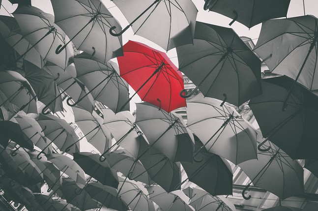 The red umbrella is a symbol reflecting the protection of those in the sex work industry.