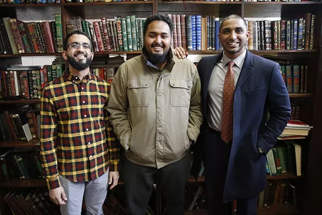 Islamic Center of Pittsburgh staff members Mohamed Sajjad and Koshin Yusuf with executive director Wasi Mohamed - CP PHOTO: JARED WICKERHAM