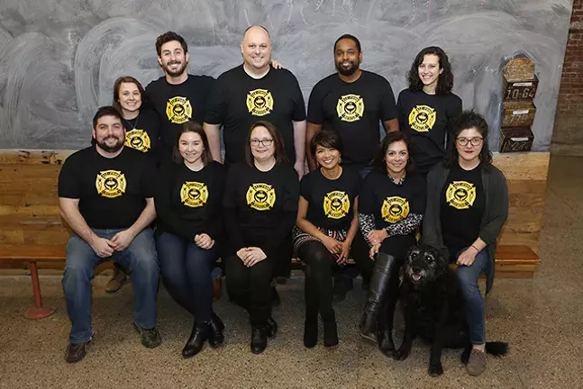 The staff of 412 Food Rescue: From left, first row: Ryan Geraghty, Becca Sufrin, Jen England, Leah Lizarondo, Sara Swaney, and Mel Cronin; Standing from left: Jaclyn Janeczko, Jake Tepperman, Anthony Levin-Decanini, Leland Scales, and Hana Uman; Not pictured: Dan Scullin and Gregg Brunner - CP PHOTO: JARED WICKERHAM