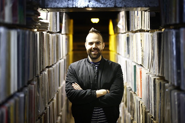 Nick Barilla inside Millvale’s Attic Record Store - CP PHOTO: JARED WICKERHAM