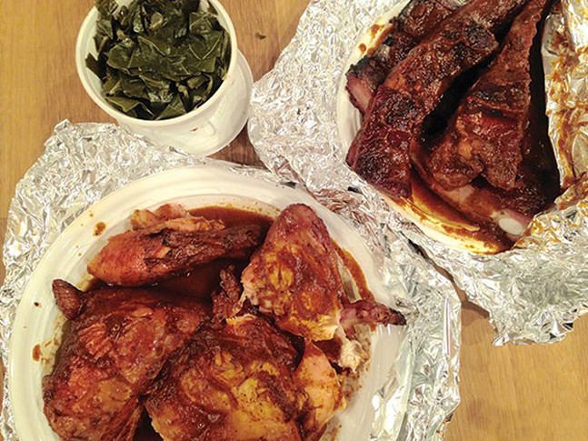 Barbecue ribs and chicken, with a side of greens, from Wilson's B-B-Q - CP PHOTO: LISA CUNNINGHAM