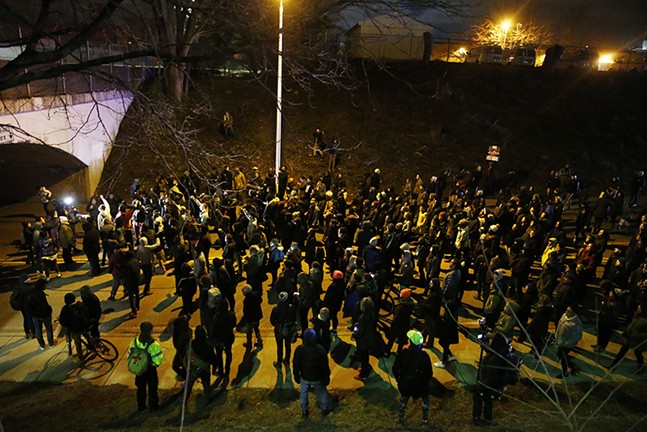 The crowd in East Liberty swelled to about 400. - CP PHOTO: JARED WICKERHAM