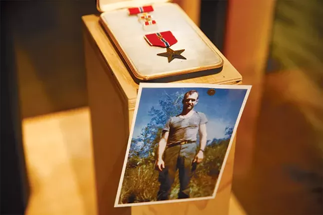 A portrait of former Pittsburgh Steeler and Vietnam veteran Rocky Bleier and his bronze star - CP PHOTO: JARED WICKERHAM