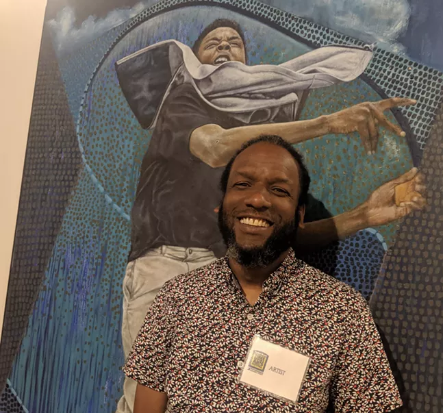 Pittsburgh artist Ulric Joseph in front of his Best of Show winning oil painting, "Target Practice" - CP PHOTO: LISA CUNNINGHAM