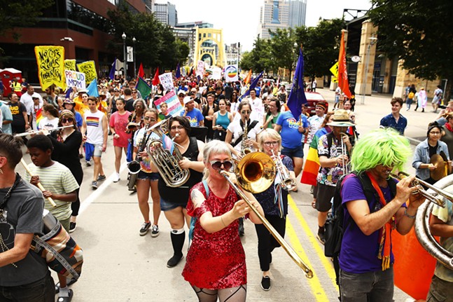 Musicians accompanied the People's Pride march as they crossed into the North Shore. - CP PHOTO: JARED WICKERHAM