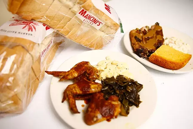 The ‘Wingit’ meal, which includes six chicken wings and a choice of sides such as cole slaw and greens - CP PHOTO: JARED WICKERHAM
