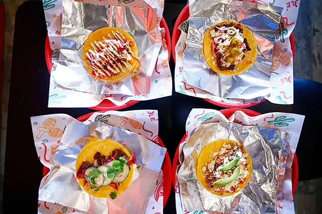 An assortment of tacos (L-R, top to bottom): Spicy shrimp, carne asada, Korean steak, and carnitas - CP PHOTO: JARED WICKERHAM