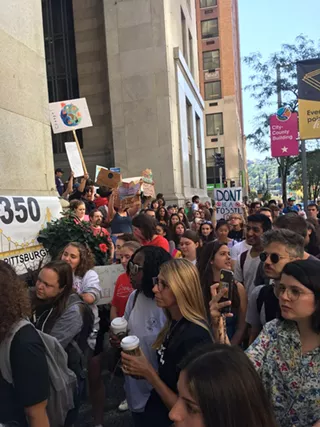 Crowds gathered around the City-Council Building for the Global Climate Strike in Pittsburgh - CP PHOTO: AMANDA WALTZ