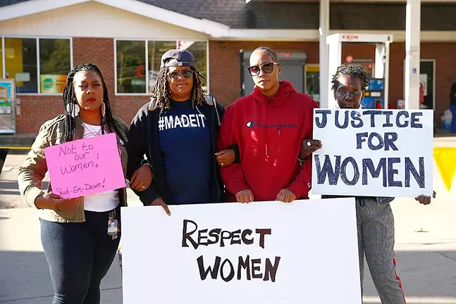 Amber Sloan (second from left) protesting outside the Exxon gas station in Marshall-Shadeland - CP PHOTO: JARED WICKERHAM