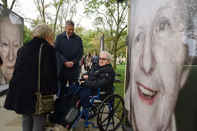 University of Pittsburgh Chancellor Patrick Gallagher speaking with Holocaust survivors at Lest We Forget. - PHOTO: TOM ALTANY/UNIVERSITY OF PITTSBURGH