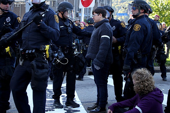 Pittsburgh Police arrest a demonstrator for unlawful protesting. - CP PHOTO: JOIE KNOUSE