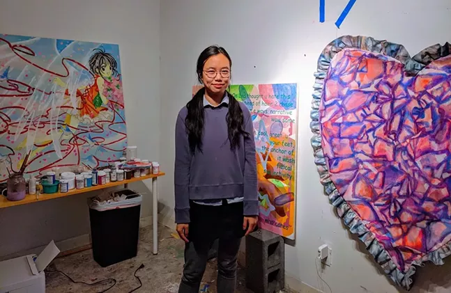 Bunker Projects artist-in-residence Veda Sun with work for her Lonely and Gorgeous Tears solo exhibition. - CP PHOTO: AMANDA WALTZ