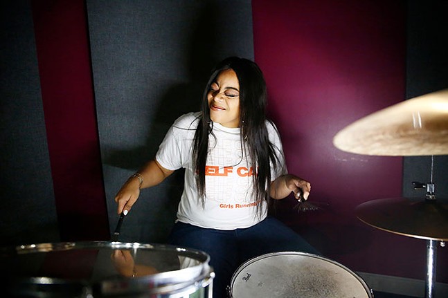 INEZ plays drums at the YMCA Lighthouse Project - CP PHOTO: JARED WICKERHAM