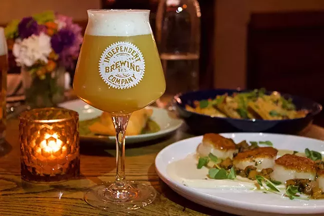 Craft beer on tap along with dayboat scallops (front) and sweet potato ravioli (back) at Independent Brewing Company - CP PHOTO: JOIE KNOUSE
