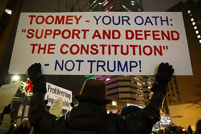 Hundreds rally in Downtown Pittsburgh in support of the impeachment of President Trump - CP PHOTO: JARED WICKERHAM