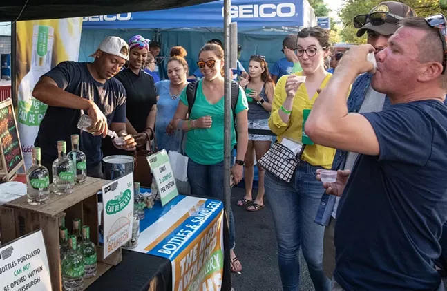 Sampling Wigle's Eau de Pickle whiskey at Picklesburgh. - PHOTO: RENEE ROSENSTEEL FOR THE PITTSBURGH DOWNTOWN PARTNERSHIP