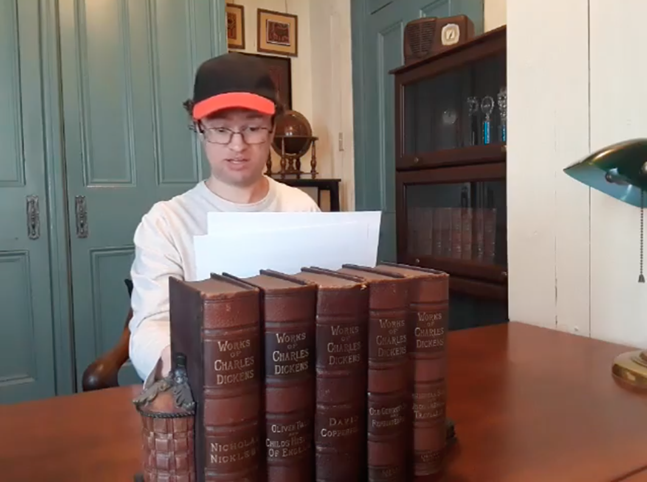 Prime Stage social media manager Matt Henderson reads from Metamorphosis - COURTESY OF PRIME STAGE THEATRE'S FACEBOOK PAGE