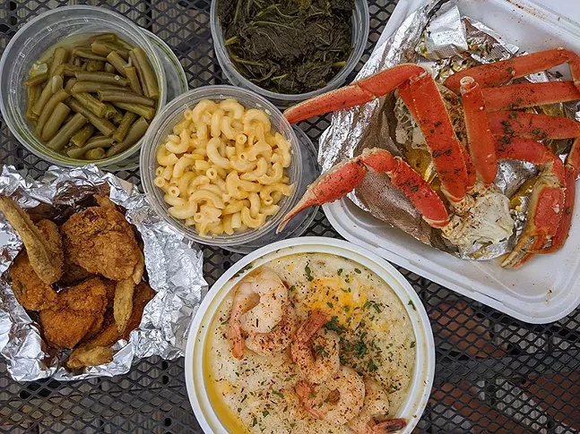 Crab, shrimp and grits, wings, mac ’n’ cheese, greens, and green beans from Soul & Sea - CP PHOTO: MAGGIE WEAVER